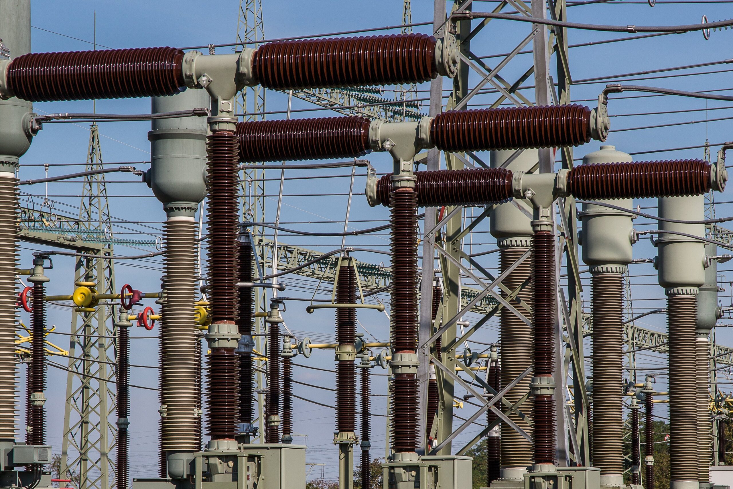 An outdoor air-insulated switchgear (AIS) substation featuring high-voltage circuit breakers, isolators, and busbars for regional grid distribution.