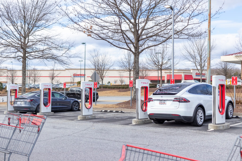 A dual-port Level 3 DC fast-charging station for electric vehicles installed in a professional parking facility.