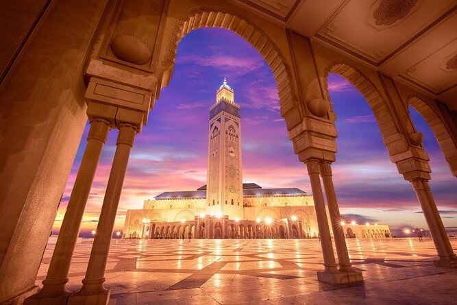 The majestic Hassan II Mosque in Casablanca, featuring the world's second tallest minaret overlooking the Atlantic Ocean with intricate zellige tilework.