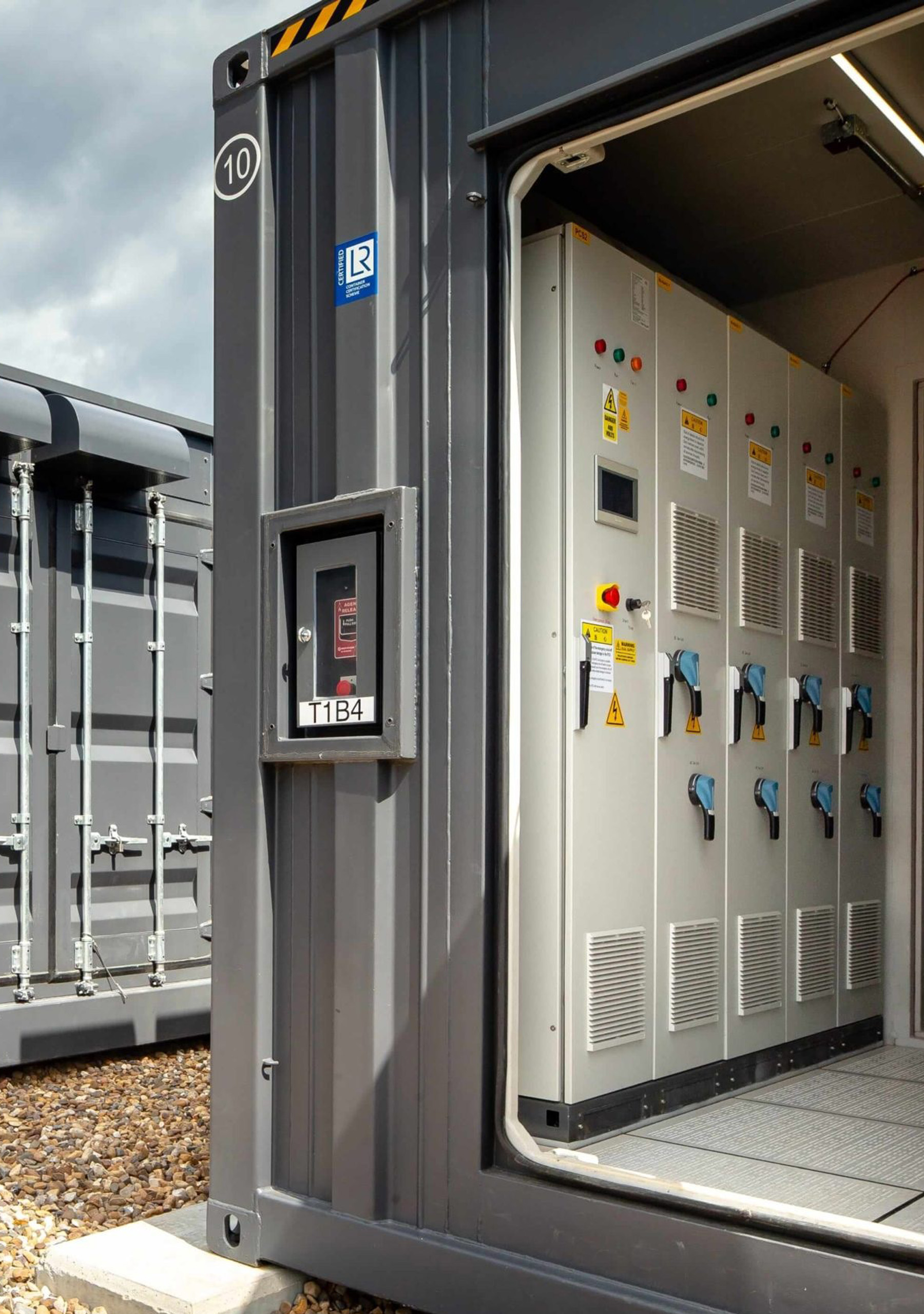 A large-scale energy storage system featuring lithium-ion battery containers and power conversion systems for industrial grid stabilization.