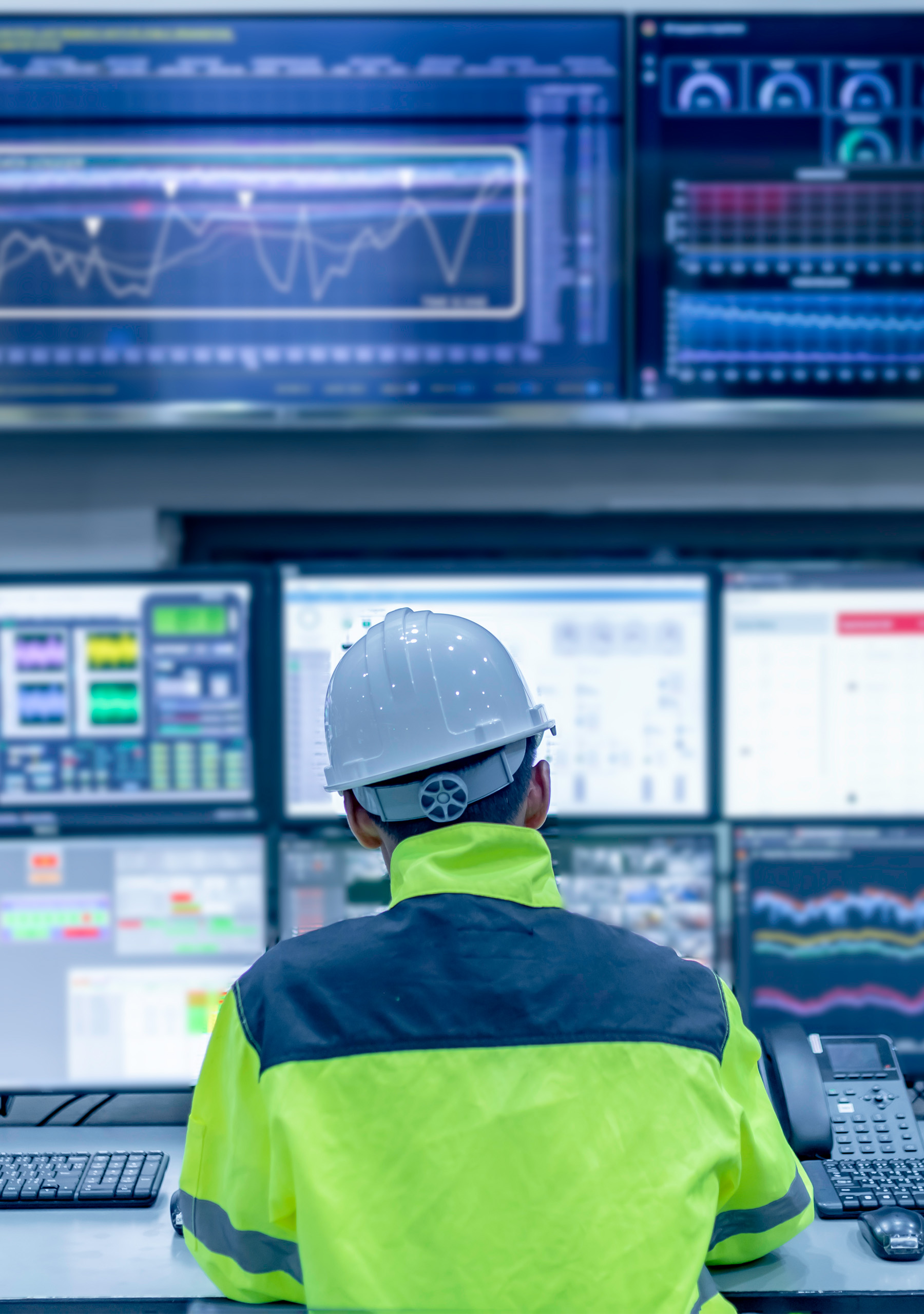 A centralized SCADA system dashboard showing live data visualization, process flow diagrams, and alarm management for an industrial plant.
