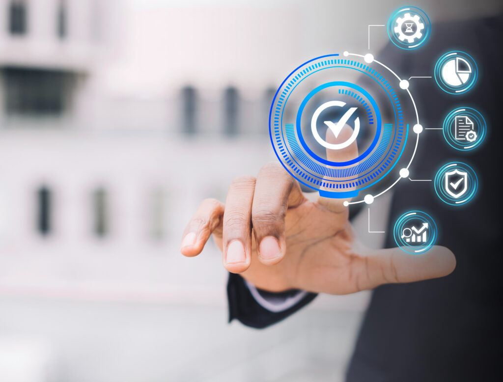 Interior view of a professional automation control cabinet featuring Programmable Logic Controllers (PLCs), I/O modules, and relay logic.